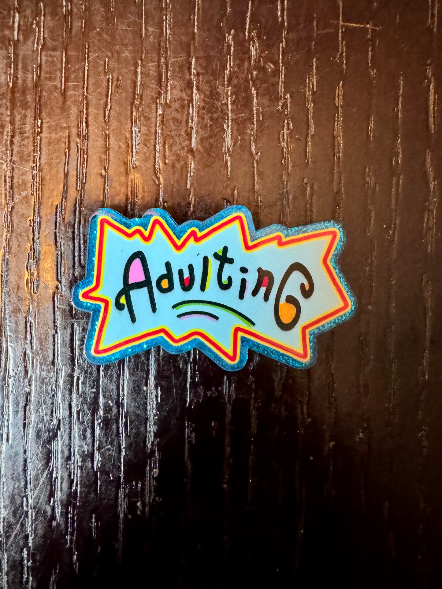 Adulting badge reel