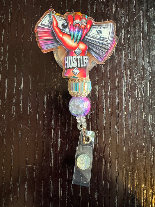 Hustler badge reel