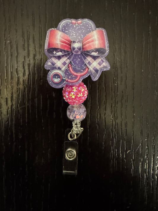 Medical bow badge reel