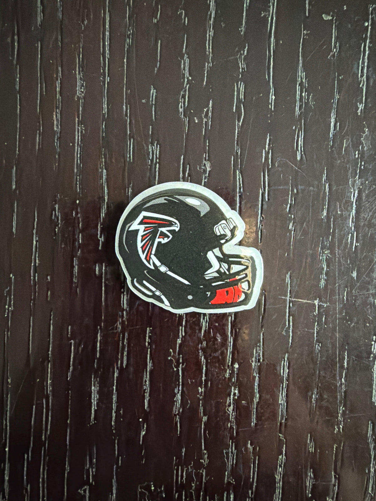 2. ADD A FOOTBALL HELMET CHARM