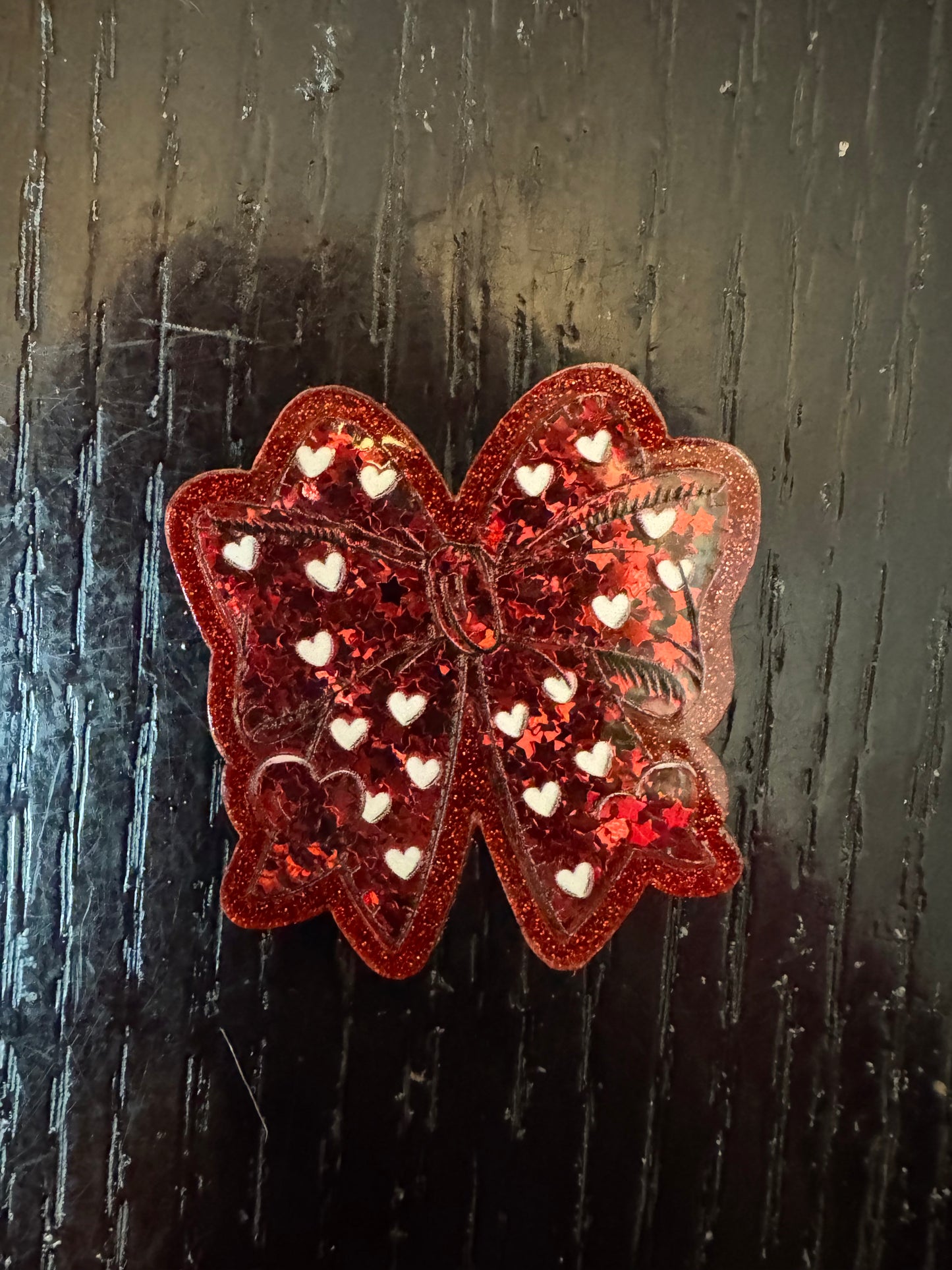 Heart bow shaker badge reel