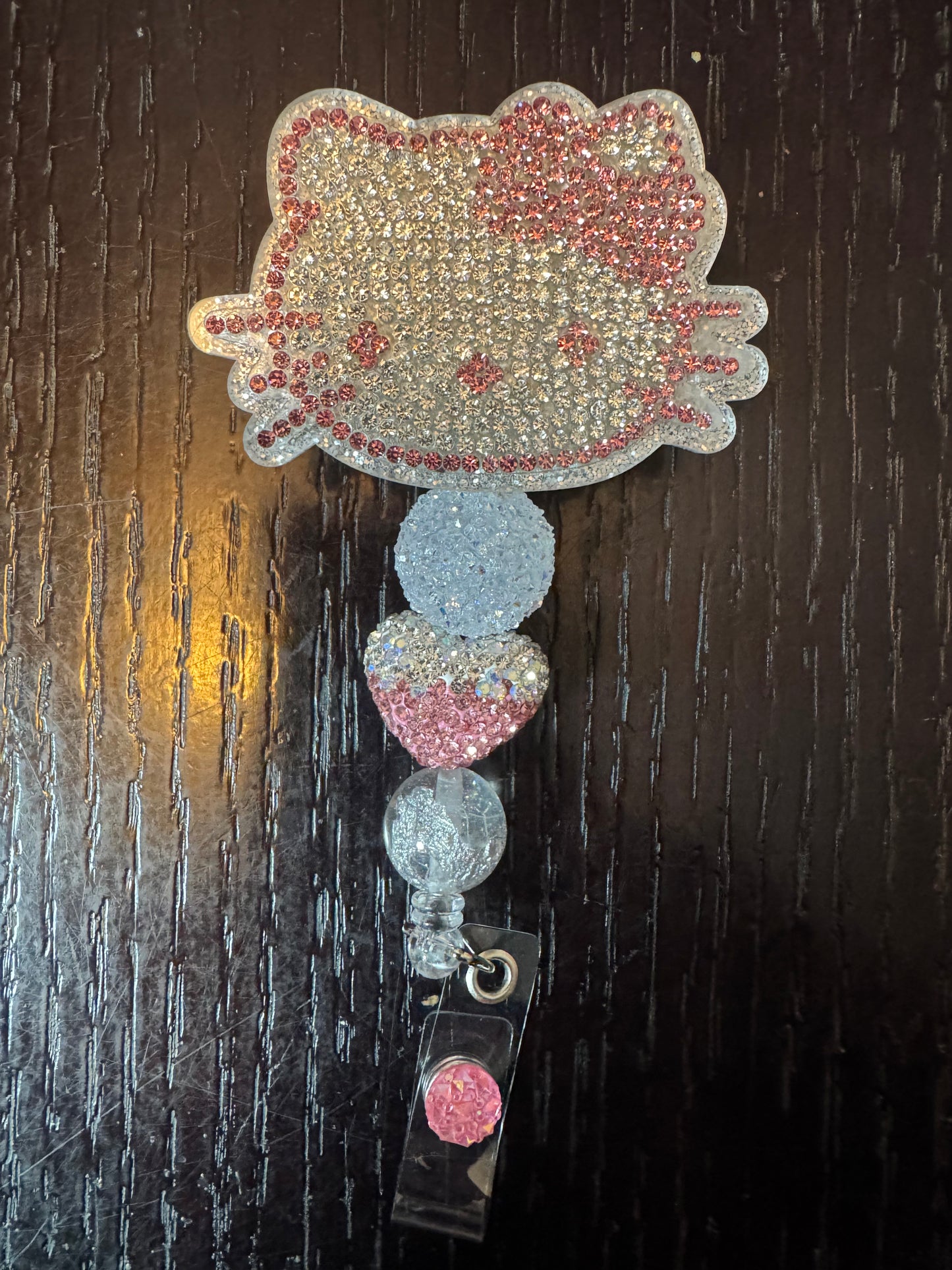 Hello kitty rhinestone head badge reel