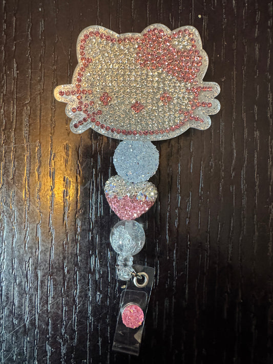 Hello kitty rhinestone head badge reel