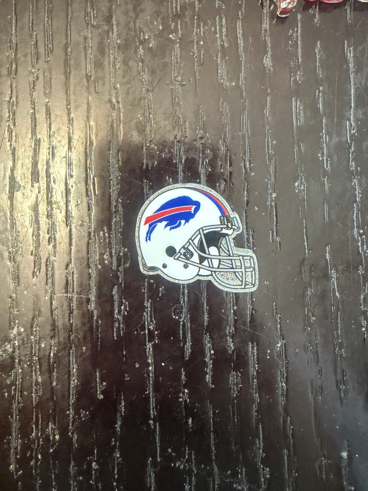 2. ADD A FOOTBALL HELMET CHARM
