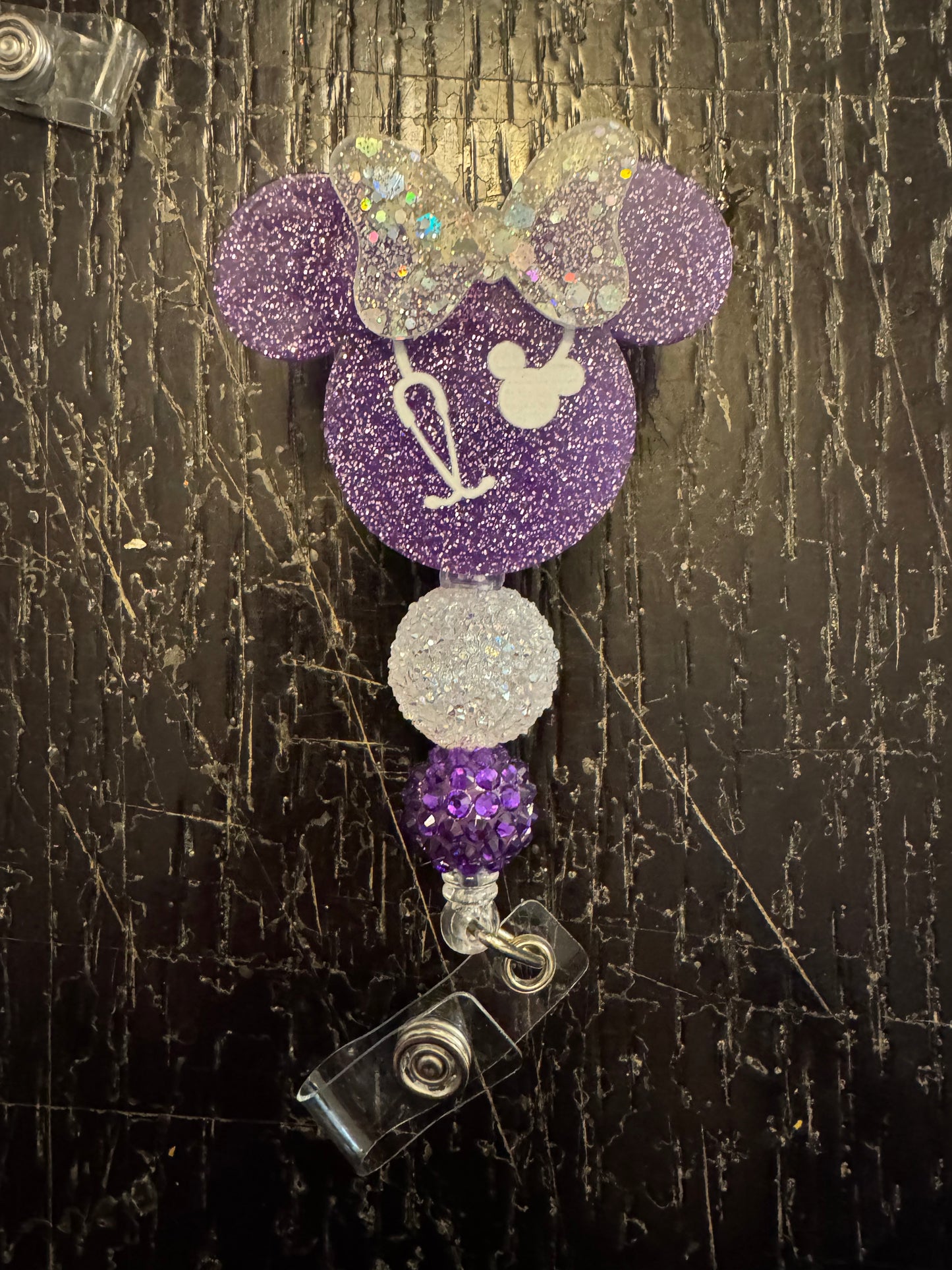 Minnie head badge reel