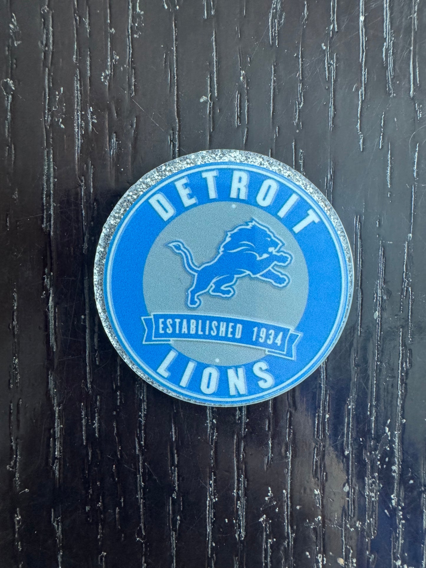 Lions badge reel