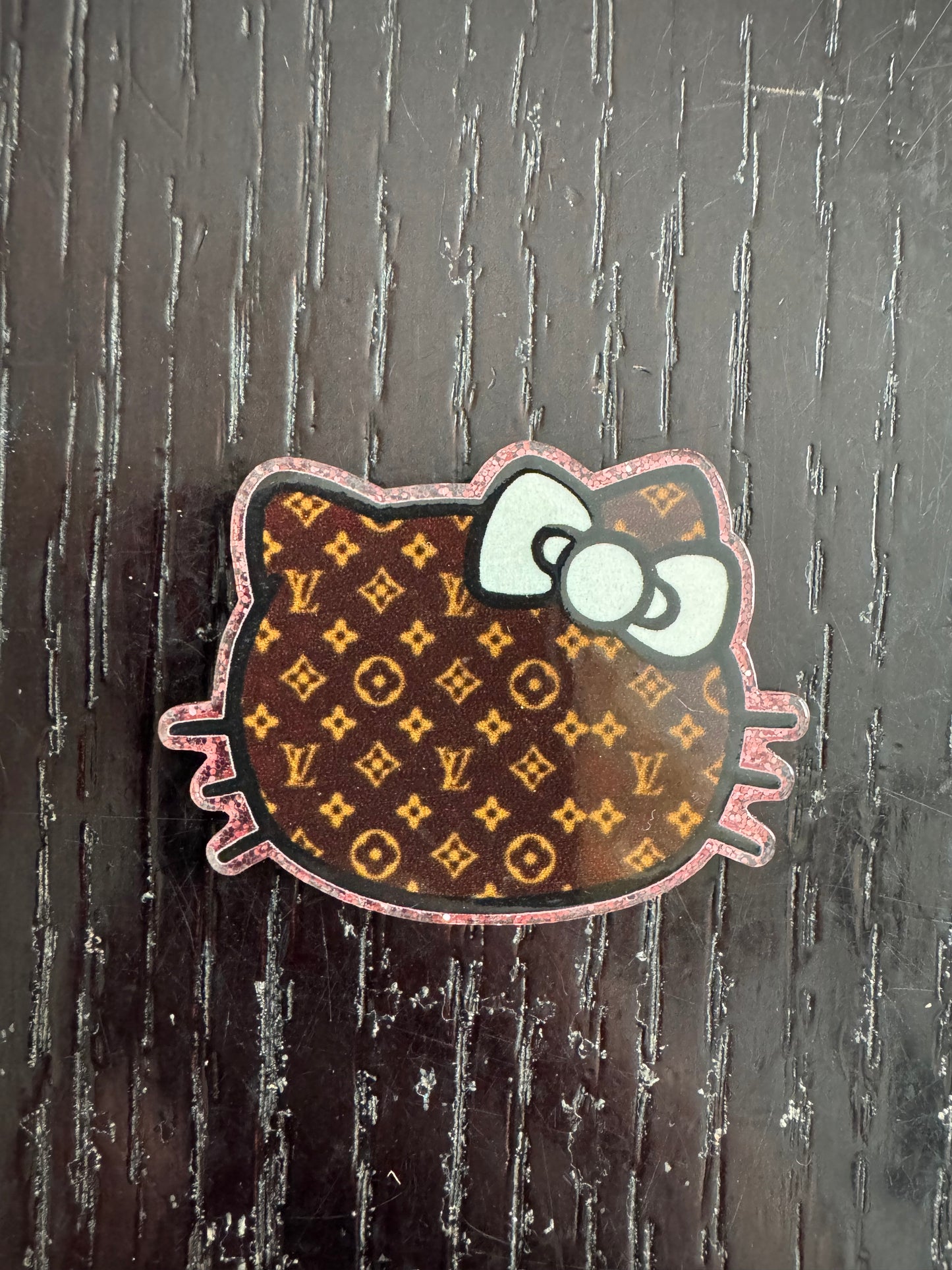 Hello Kitty LV badge reel