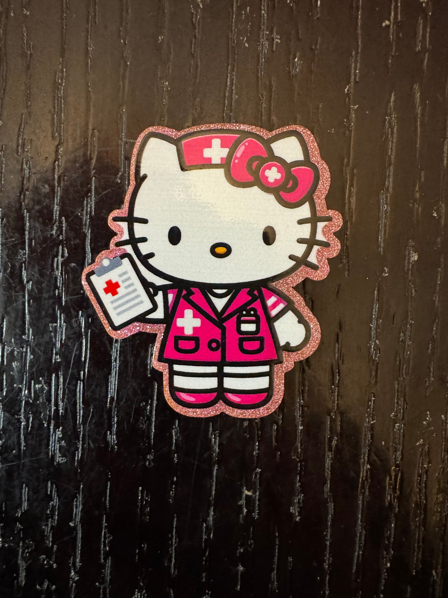 Hello Kitty nurse badge reel