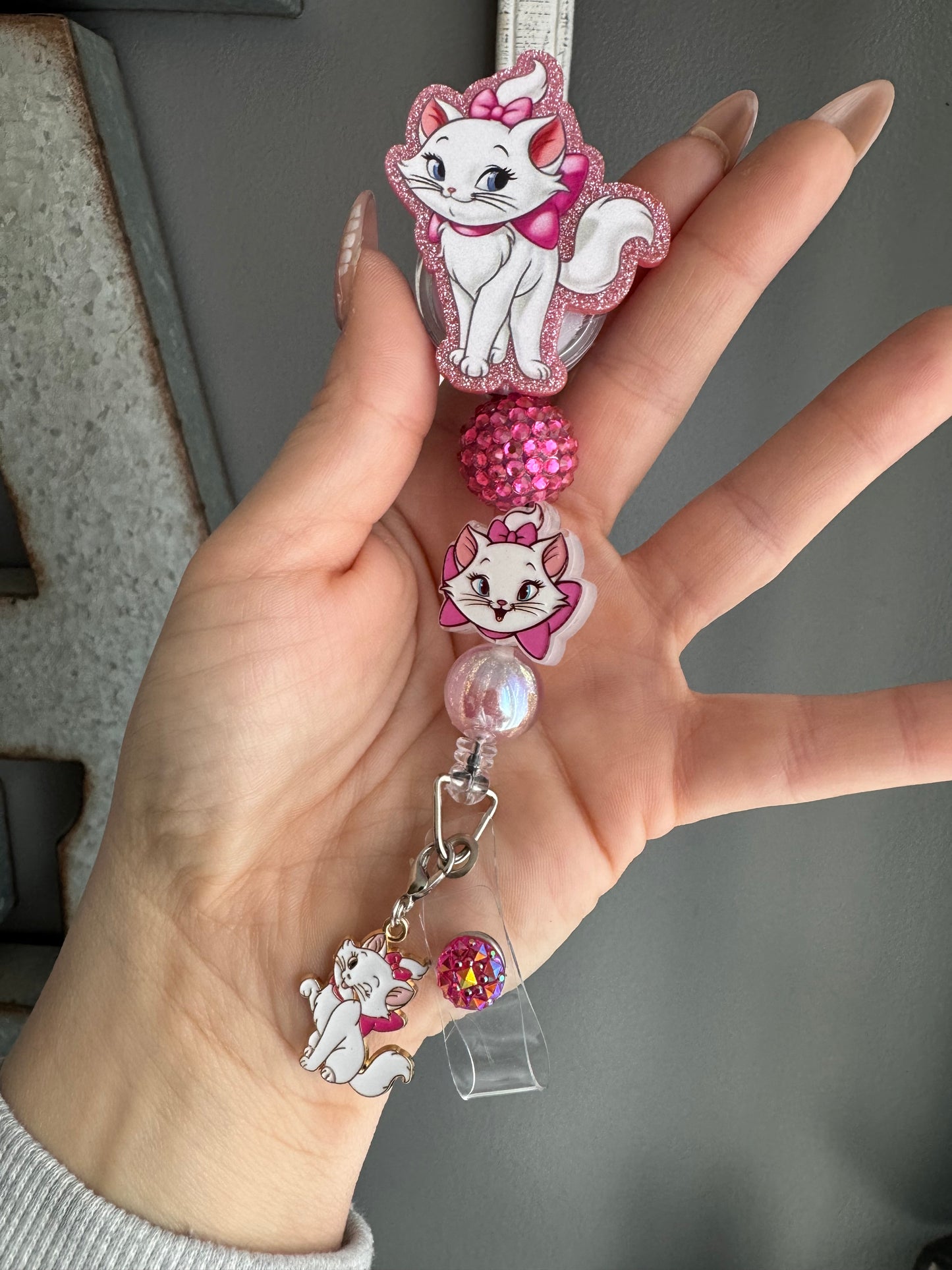 Marie Cat badge reel