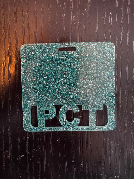 PCT teal glitter badge buddy