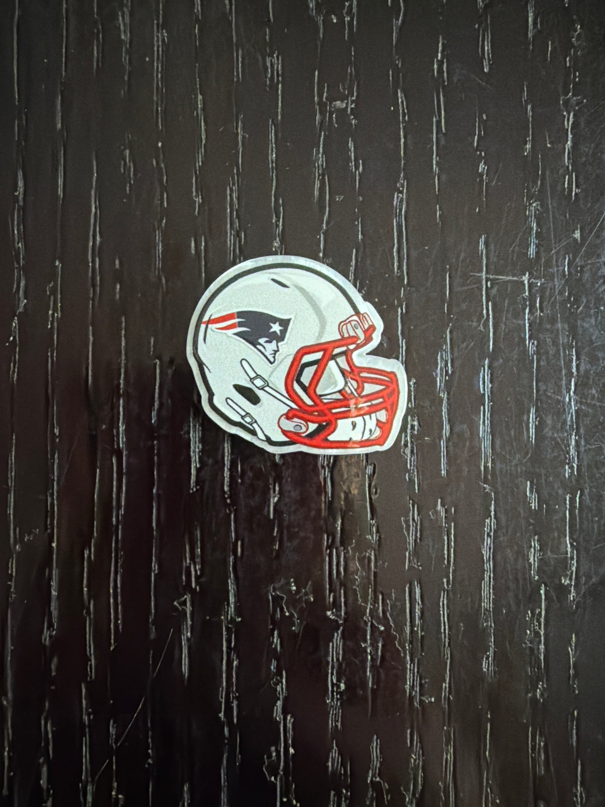 2. ADD A FOOTBALL HELMET CHARM