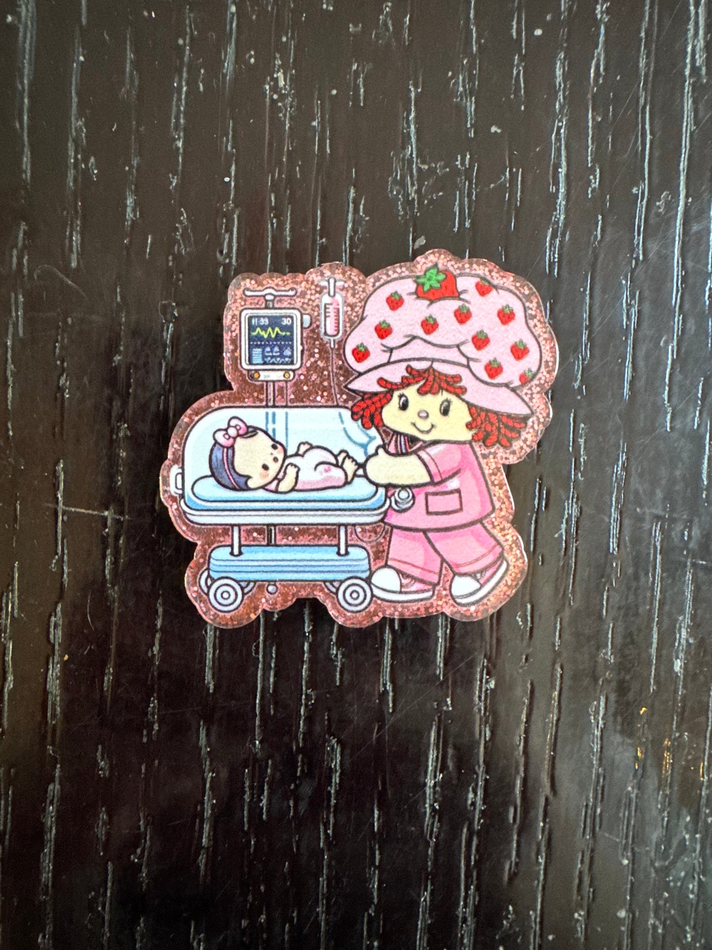 Strawberry shortcake baby badge reel