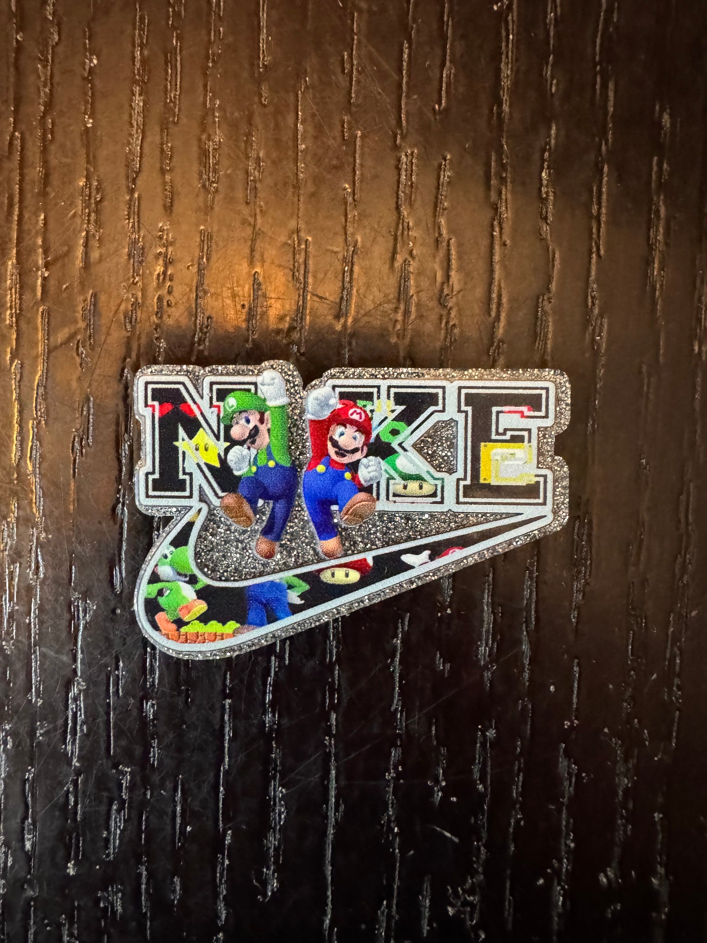 Super Mario Nike badge reel