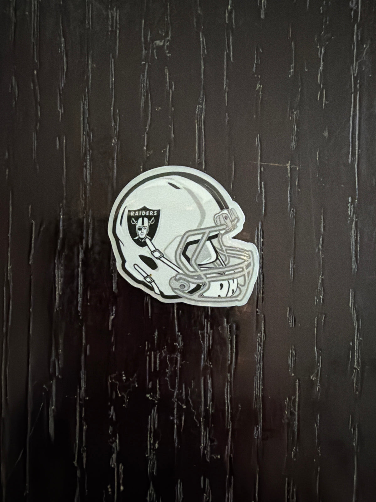 2. ADD A FOOTBALL HELMET CHARM