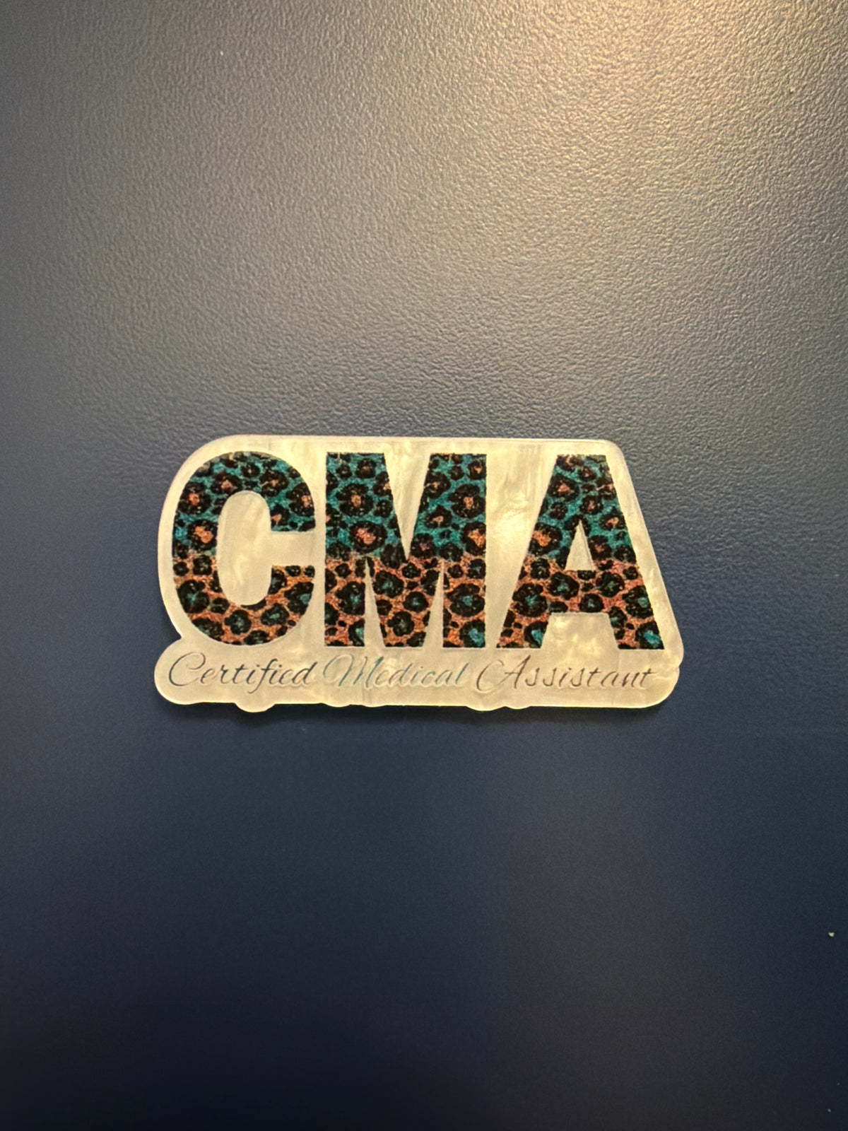 CMA badge reel