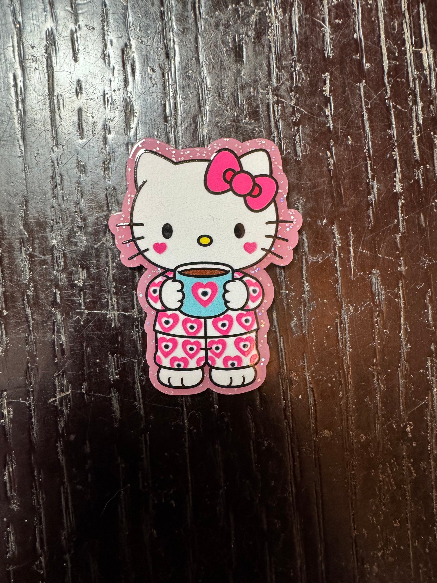 Hello kitty badge reel