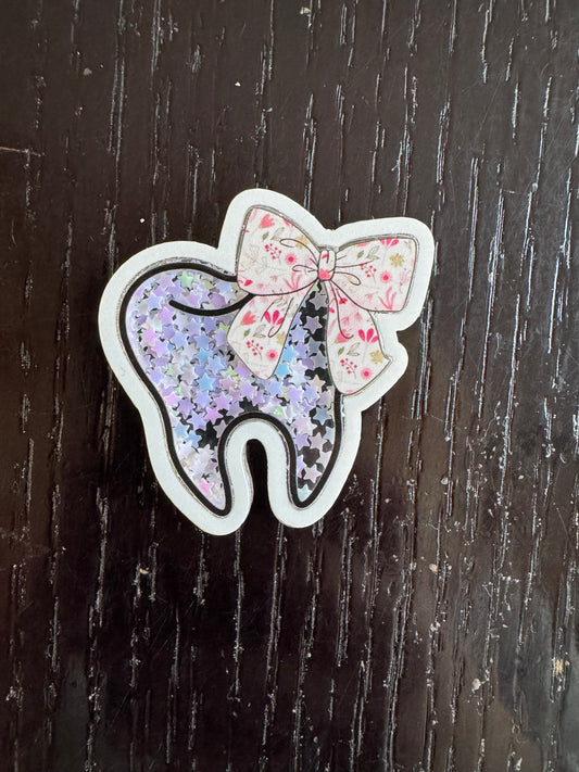 Dental shaker badge reel