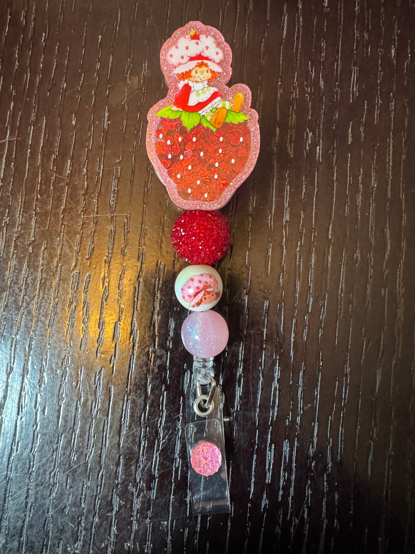 Strawberry shortcake shaker badge reel