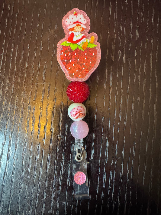 Strawberry shortcake shaker badge reel