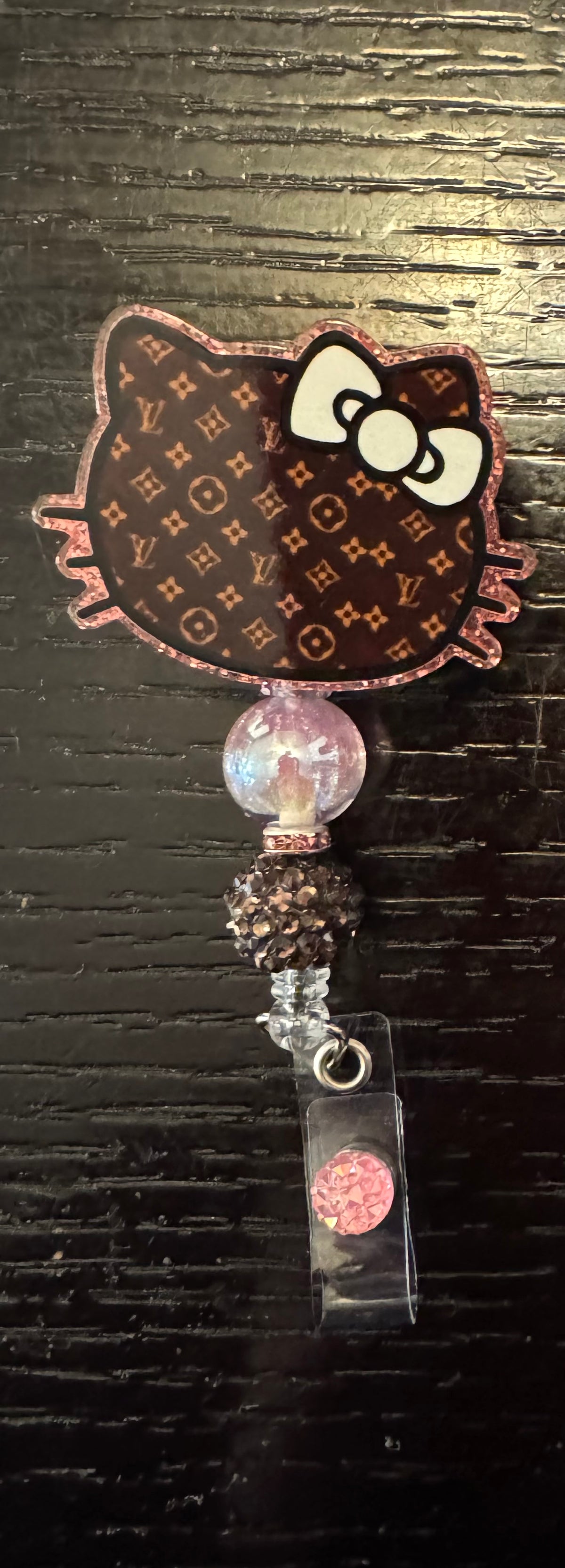 Hello Kitty LV badge reel