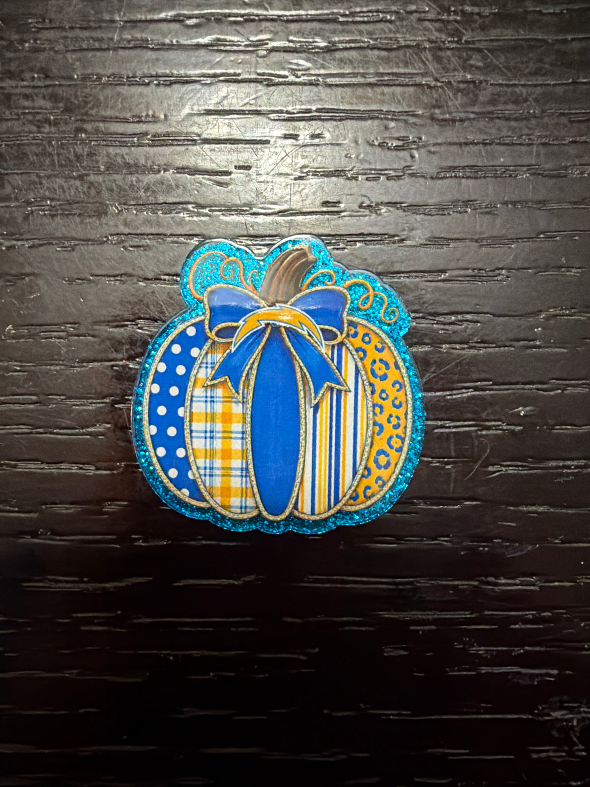 Chargers badge reel