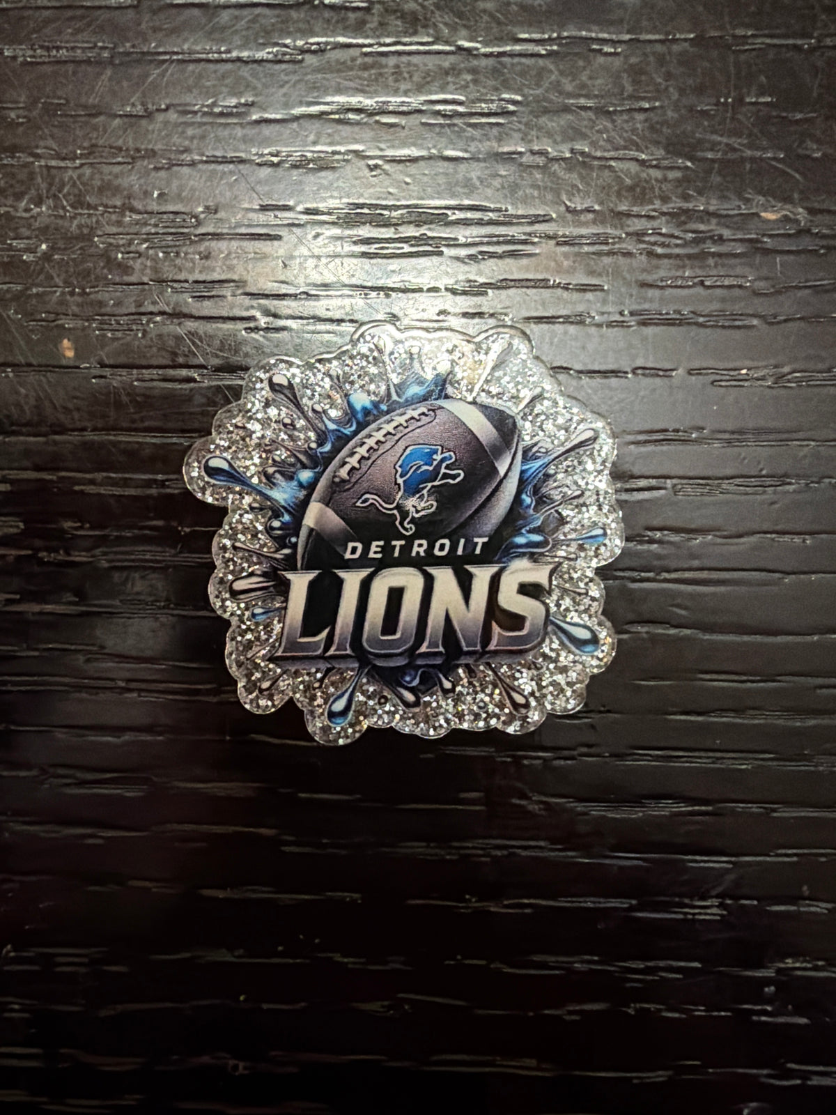 Lions badge reel
