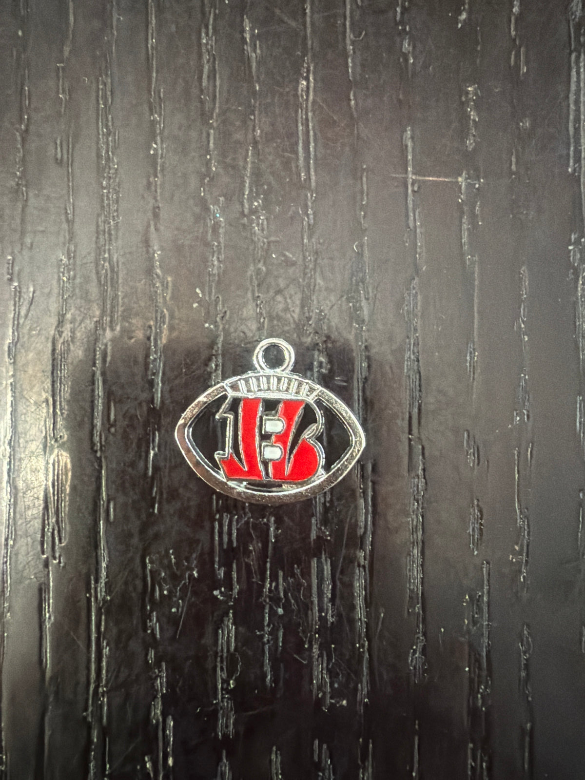 1. ADD A FOOTBALL CHARM