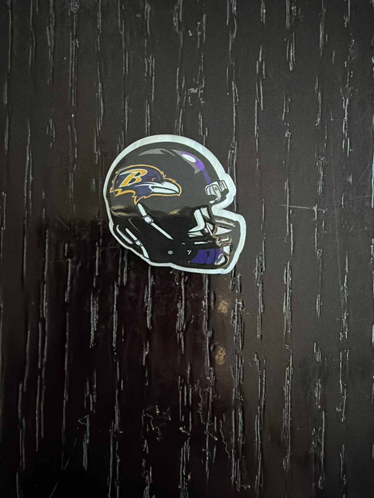 2. ADD A FOOTBALL HELMET CHARM