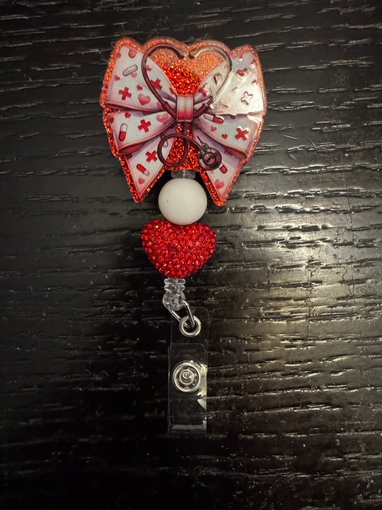 Medical bow badge reel