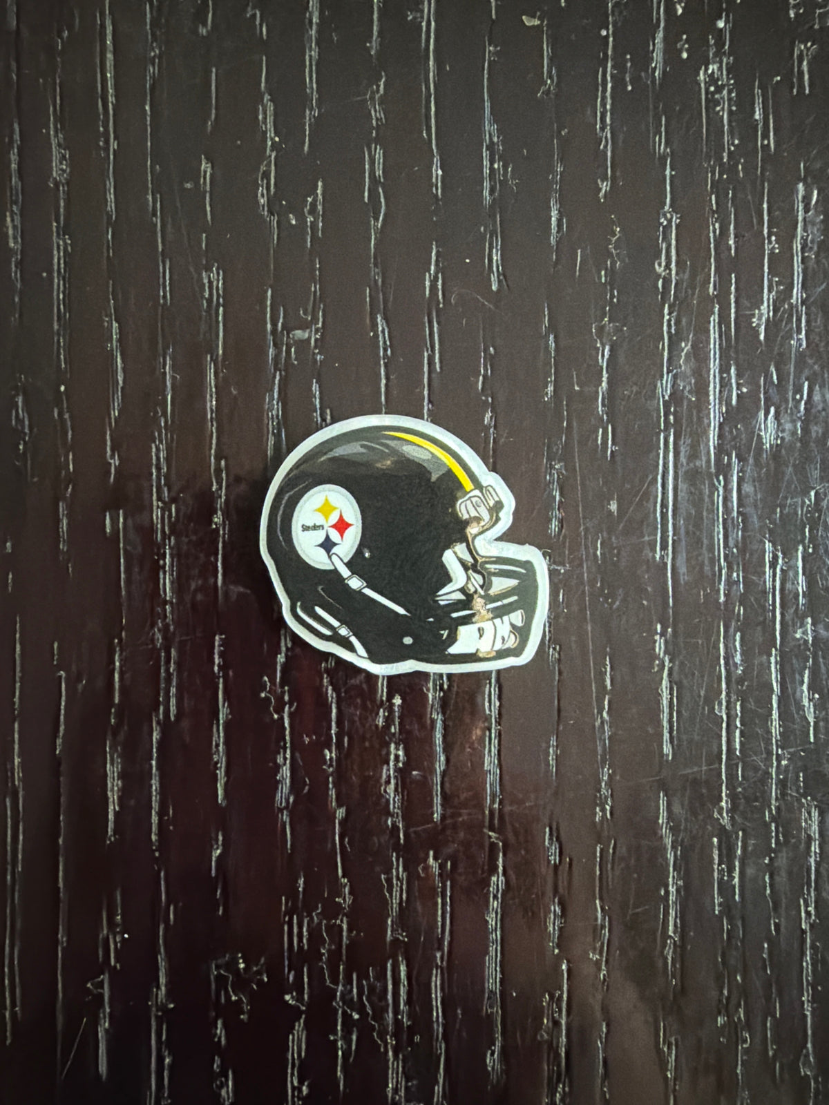 2. ADD A FOOTBALL HELMET CHARM
