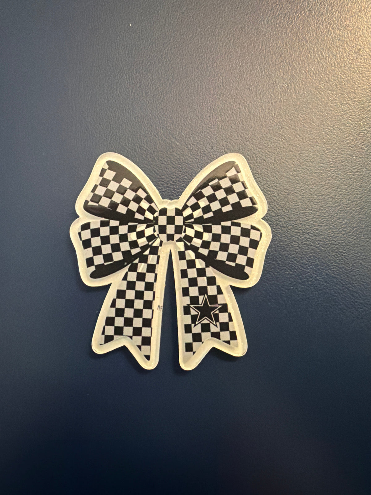 3. ADD A BOW FOOTBALL CHARM