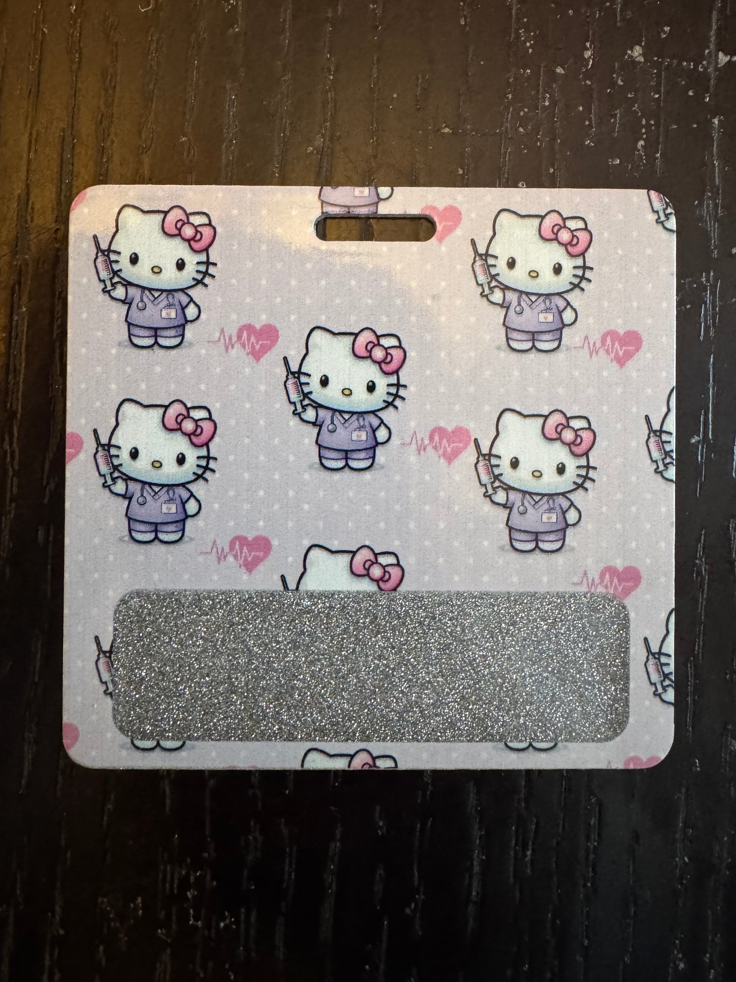 Hello Kitty badge buddy