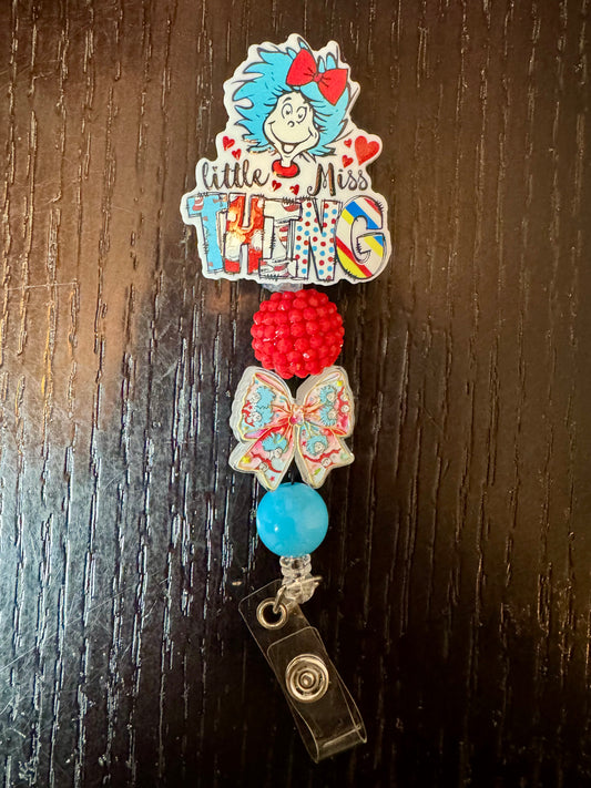 Little Miss Thing badge reel