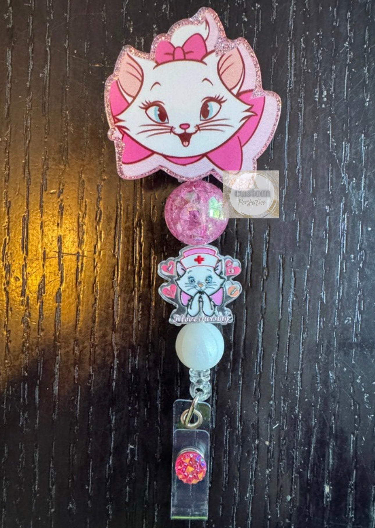 Marie Cat badge reel