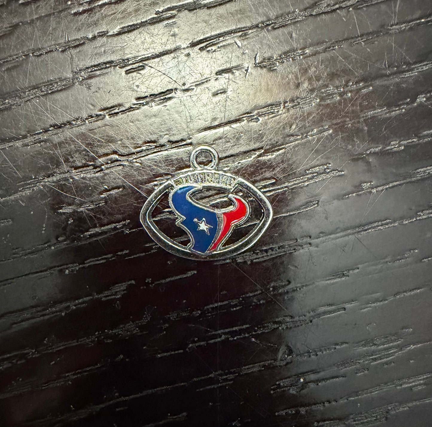 1. ADD A FOOTBALL CHARM