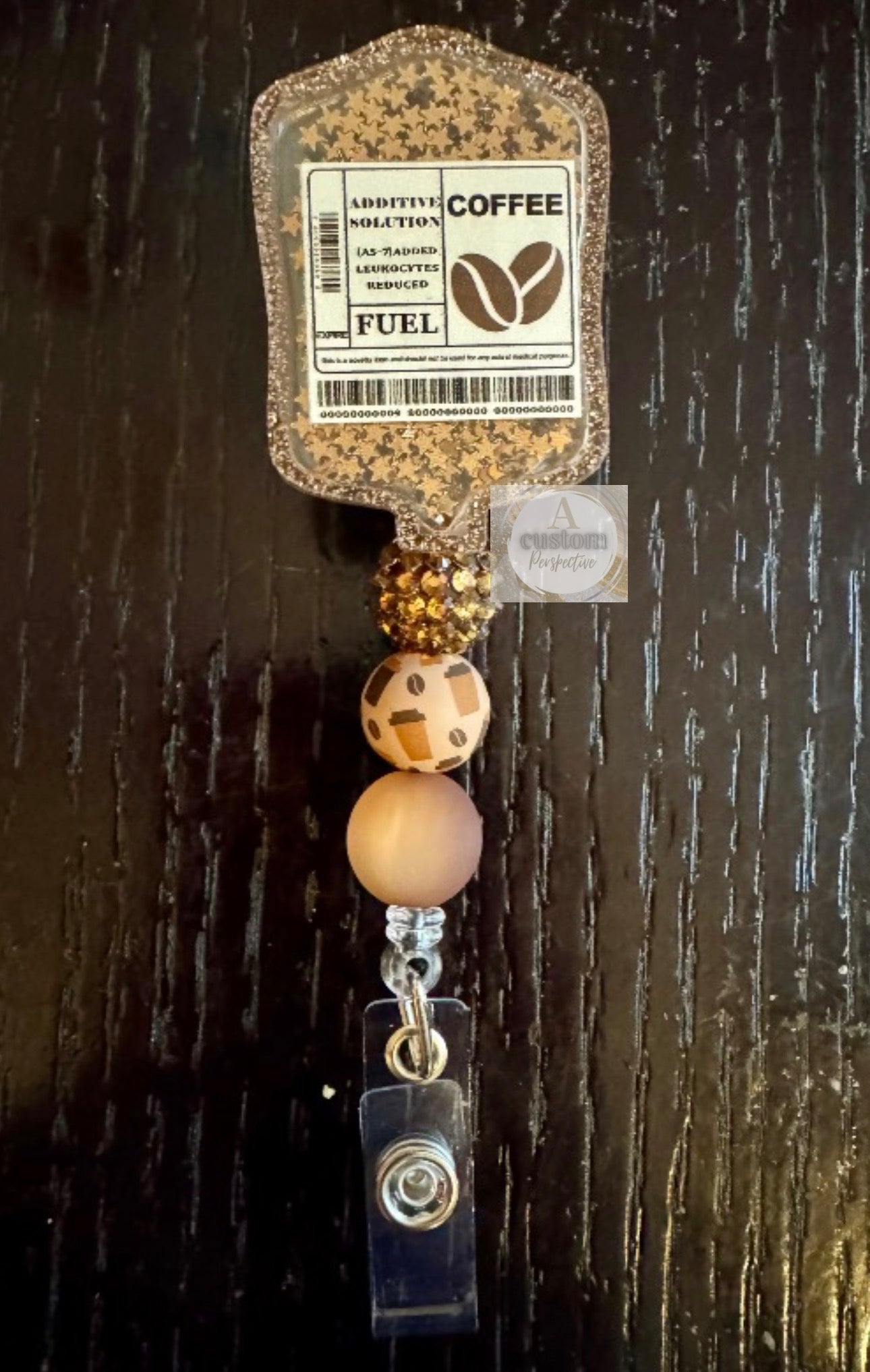 Coffee shaker badge reel