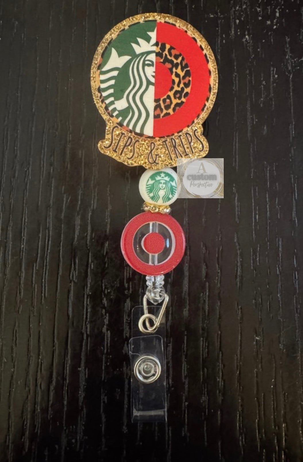 Sips & Trips badge reel