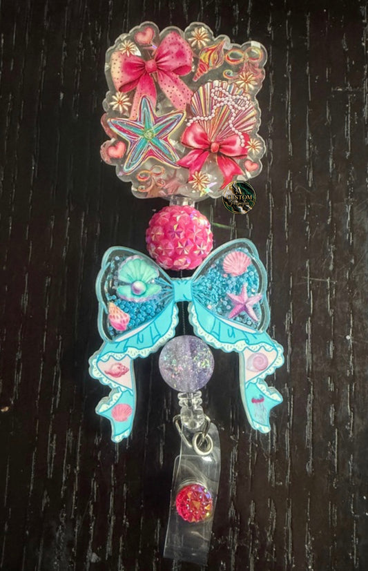 Seashell badge reel