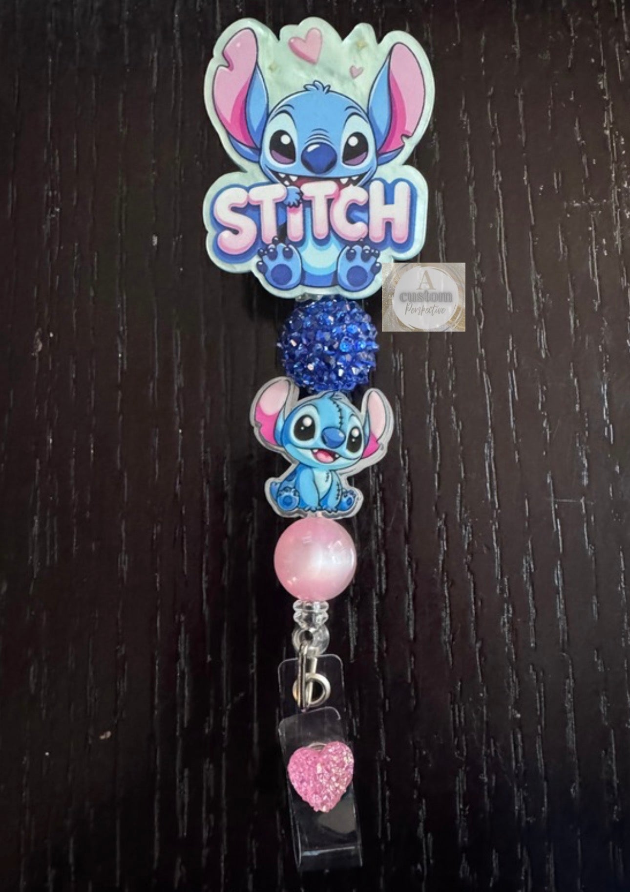 Stitch badge reel