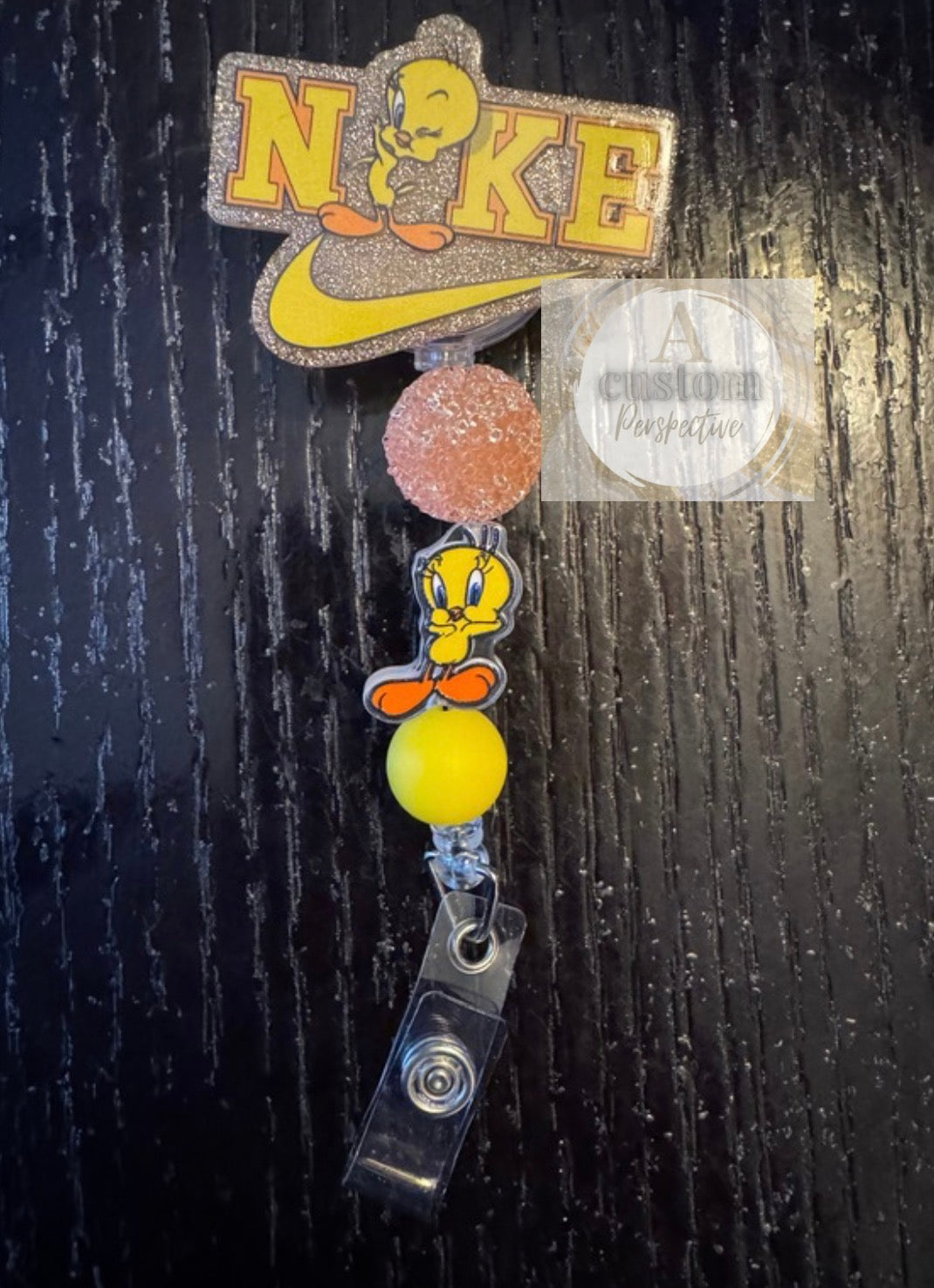 Tweety Nike badge reel