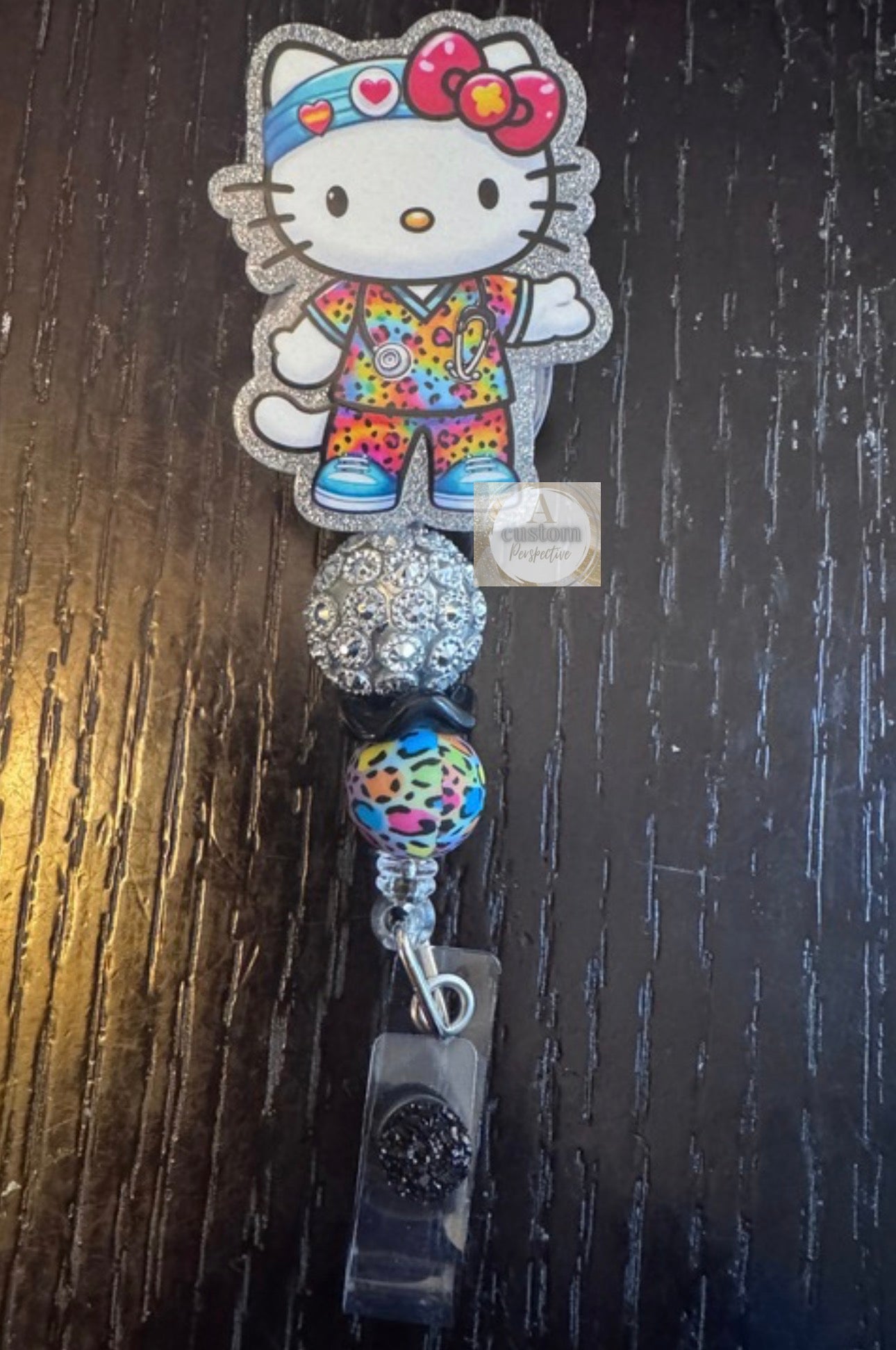 Hello Kitty nurse badge reel