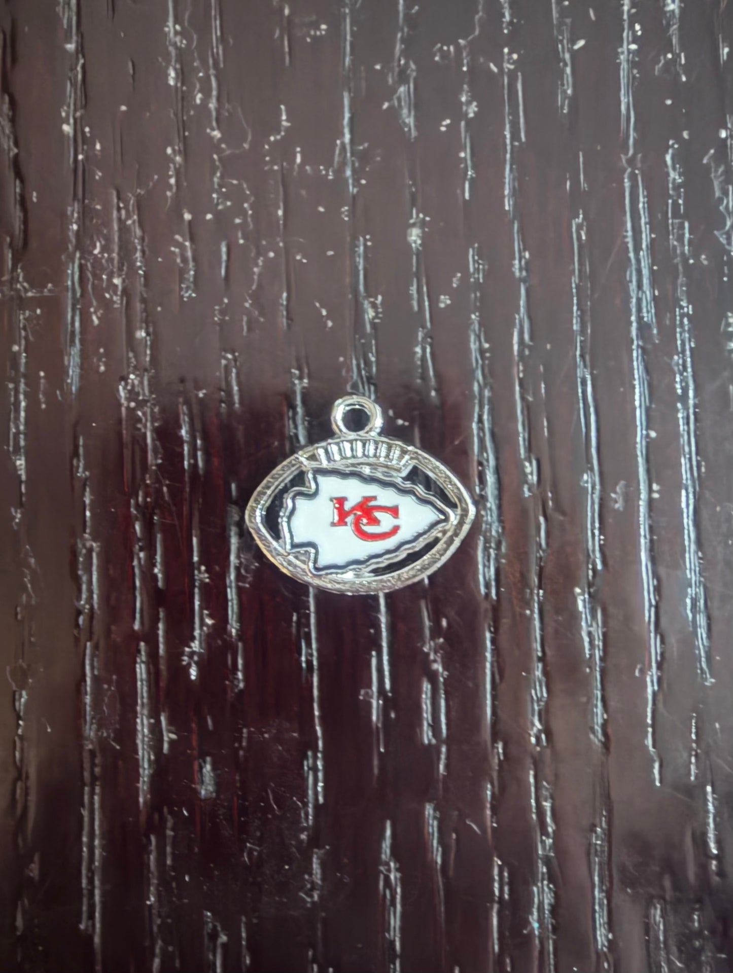 1. ADD A FOOTBALL CHARM