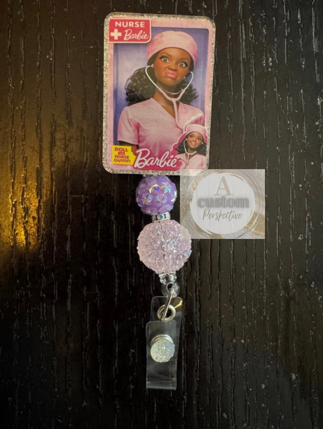 Barbie badge reel