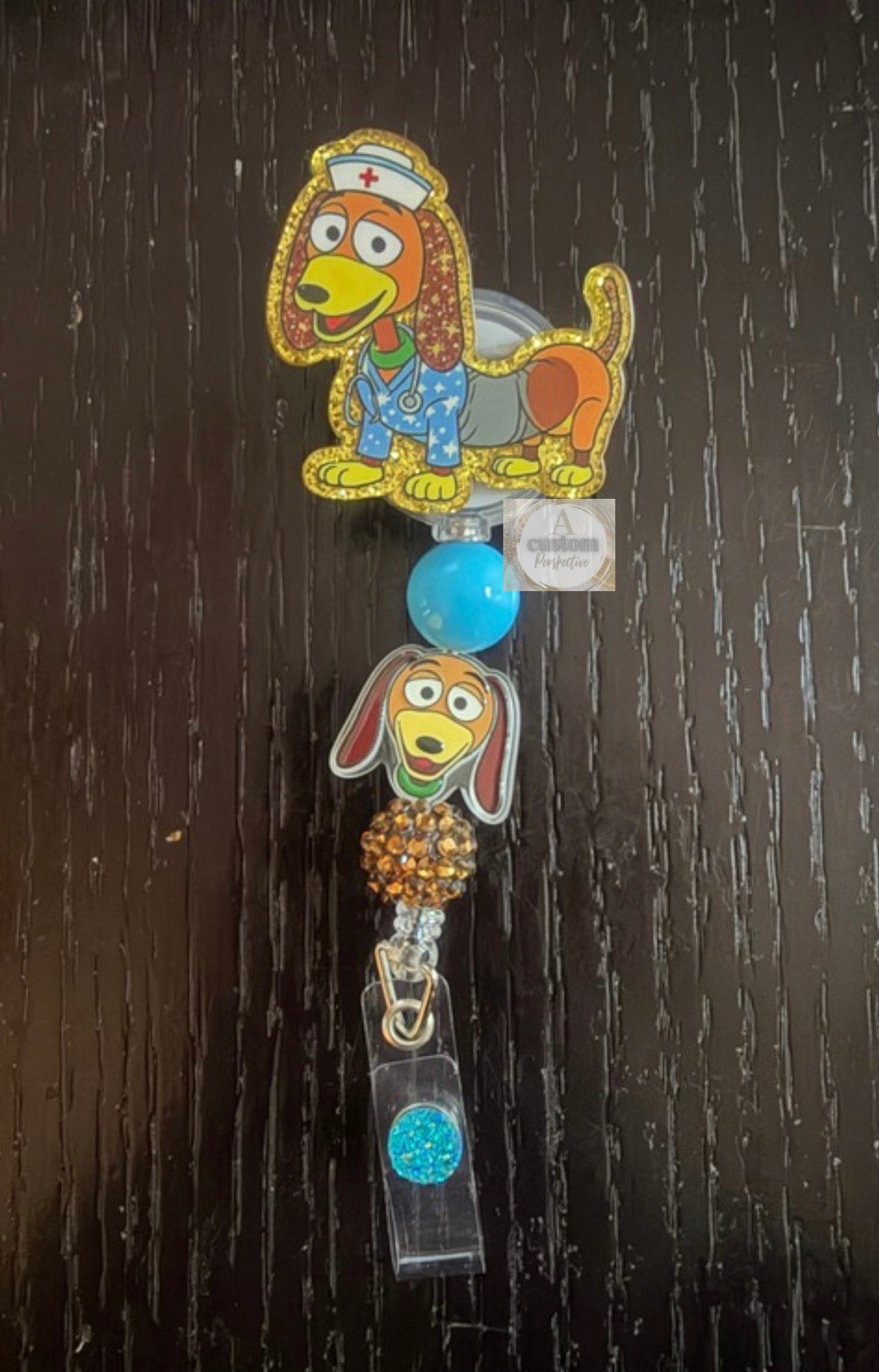 Slinky nurse  (Toy Story) badge reel