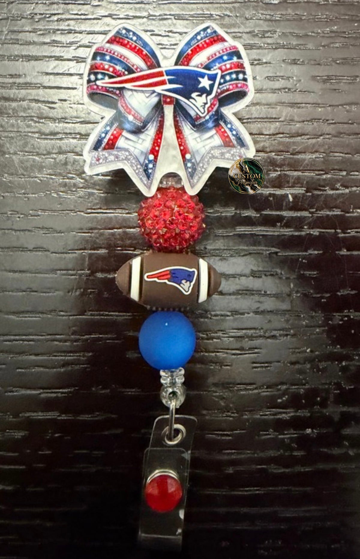 Patriots bow badge reel