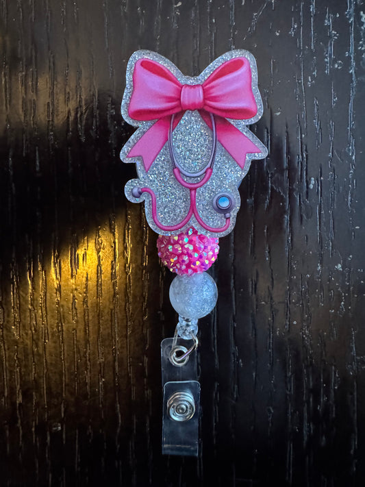 Bow badge reel