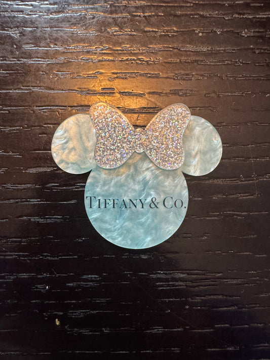 Tiffany & Co. minnie head badge reel