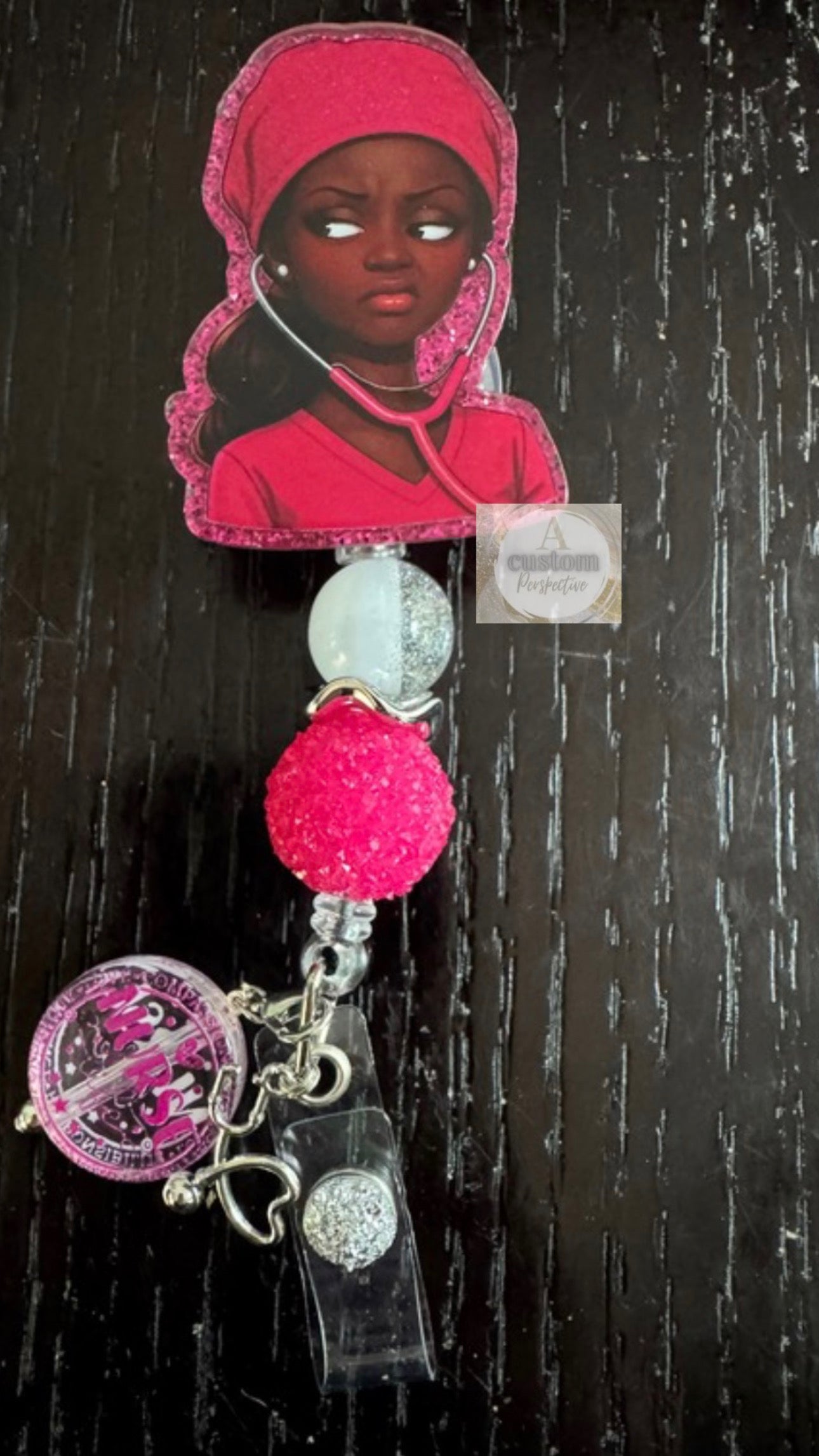 Barbie badge reel