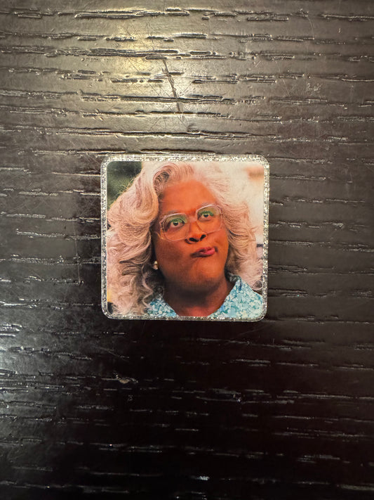 Madea badge reel