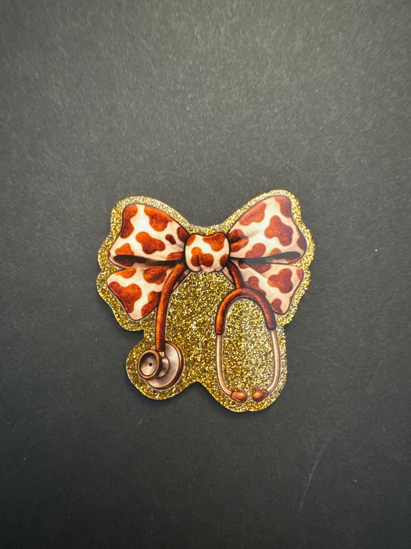 Medical bow badge reel